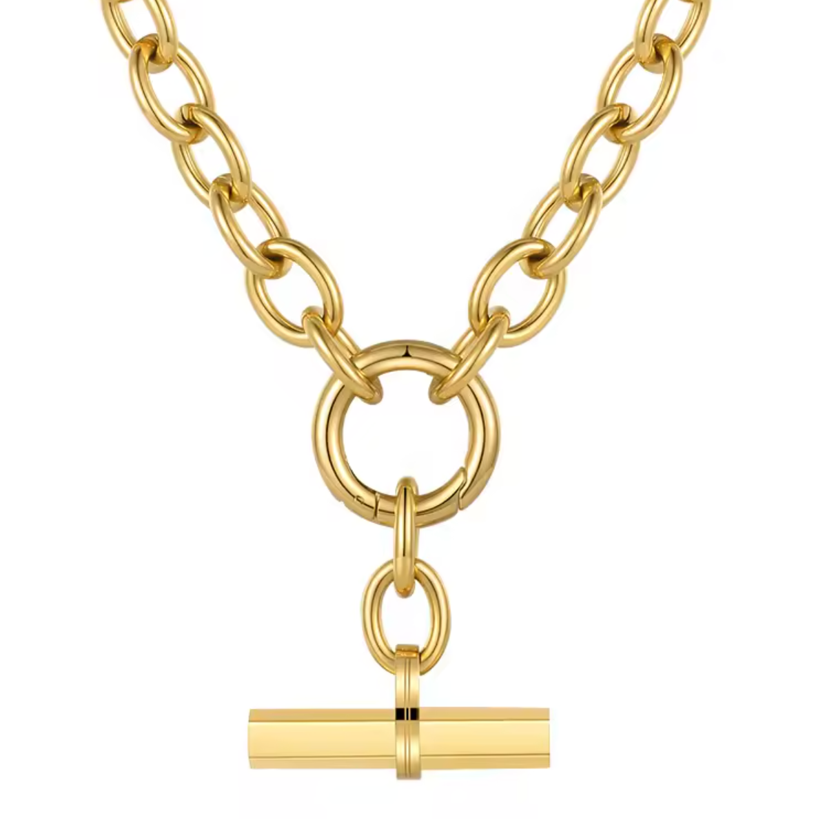 Gold chain necklace with a cylindrical pendant on a white background