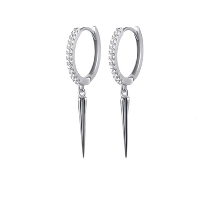 A pair of silver hoop earrings with zircon gemstones set within the hoops.